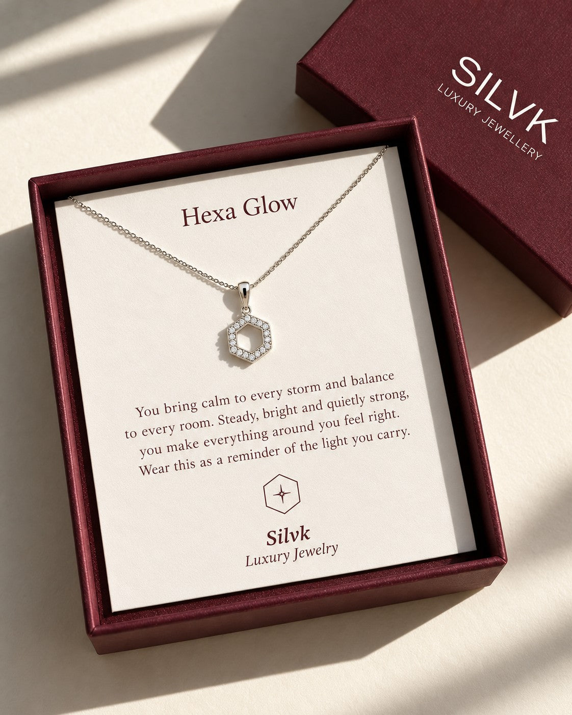 Hexa Glow silver pendant necklace in an open Silvk gift box with its message card, Silvk 925 silver jewellery