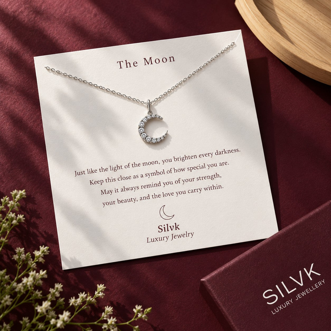 The Moon pendant on its message card with a Silvk gift box, Silvk 925 silver jewellery
