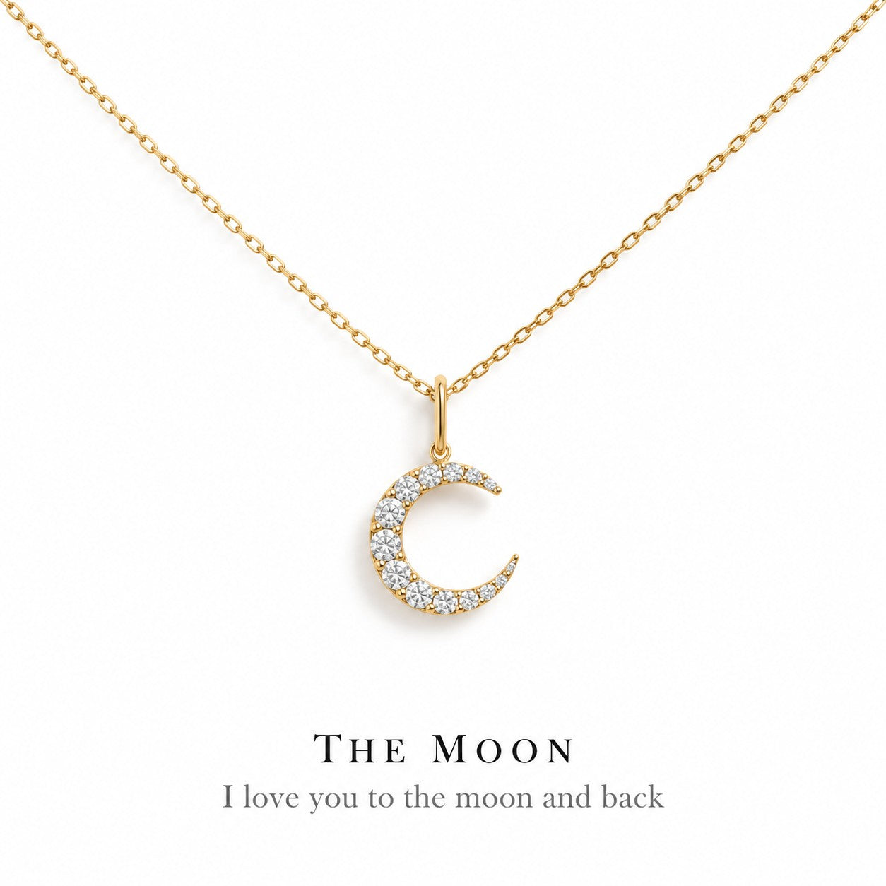 The Moon gold crescent pendant necklace on a white background, Silvk 925 silver jewellery