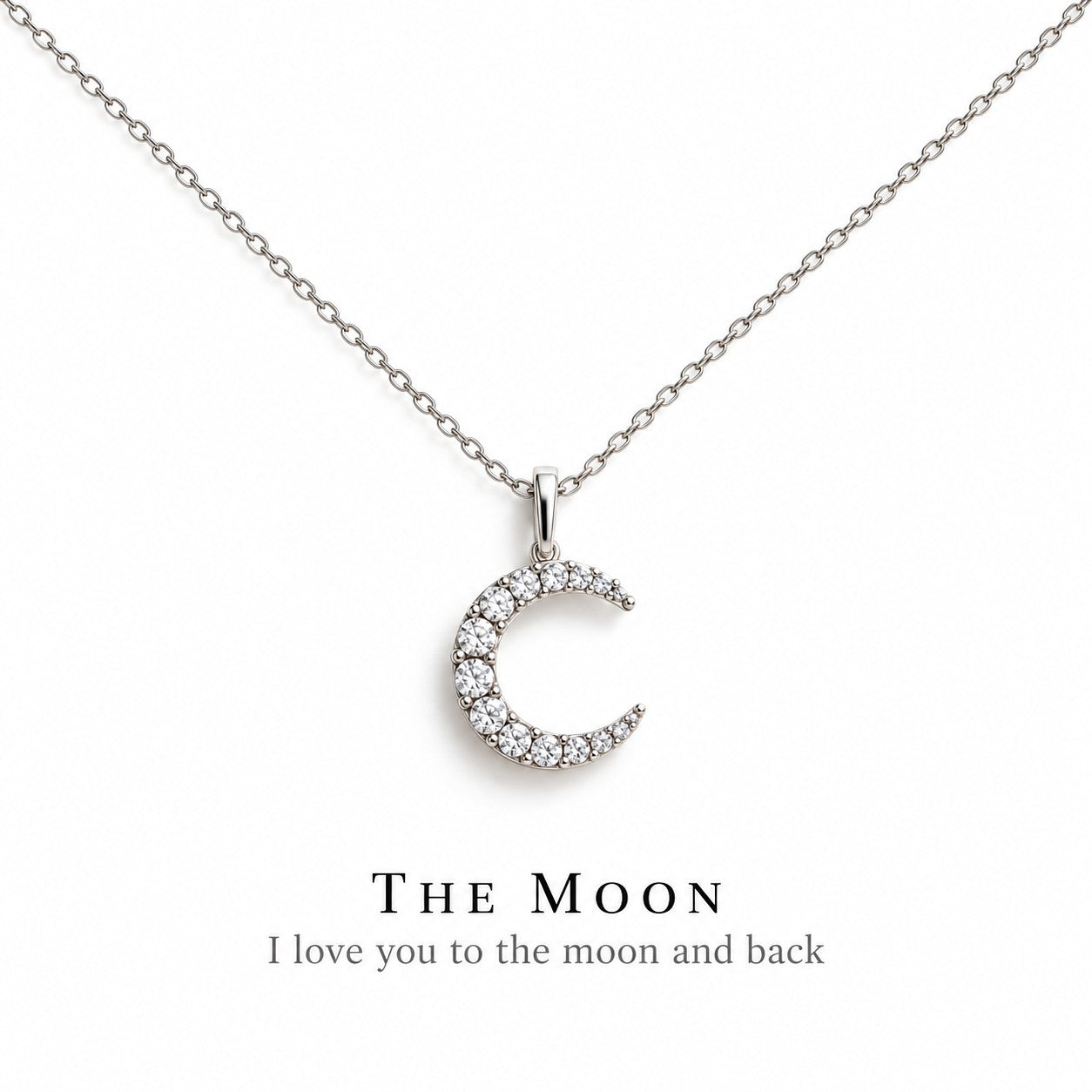 The Moon silver crescent pendant necklace on a white background, Silvk 925 silver jewellery